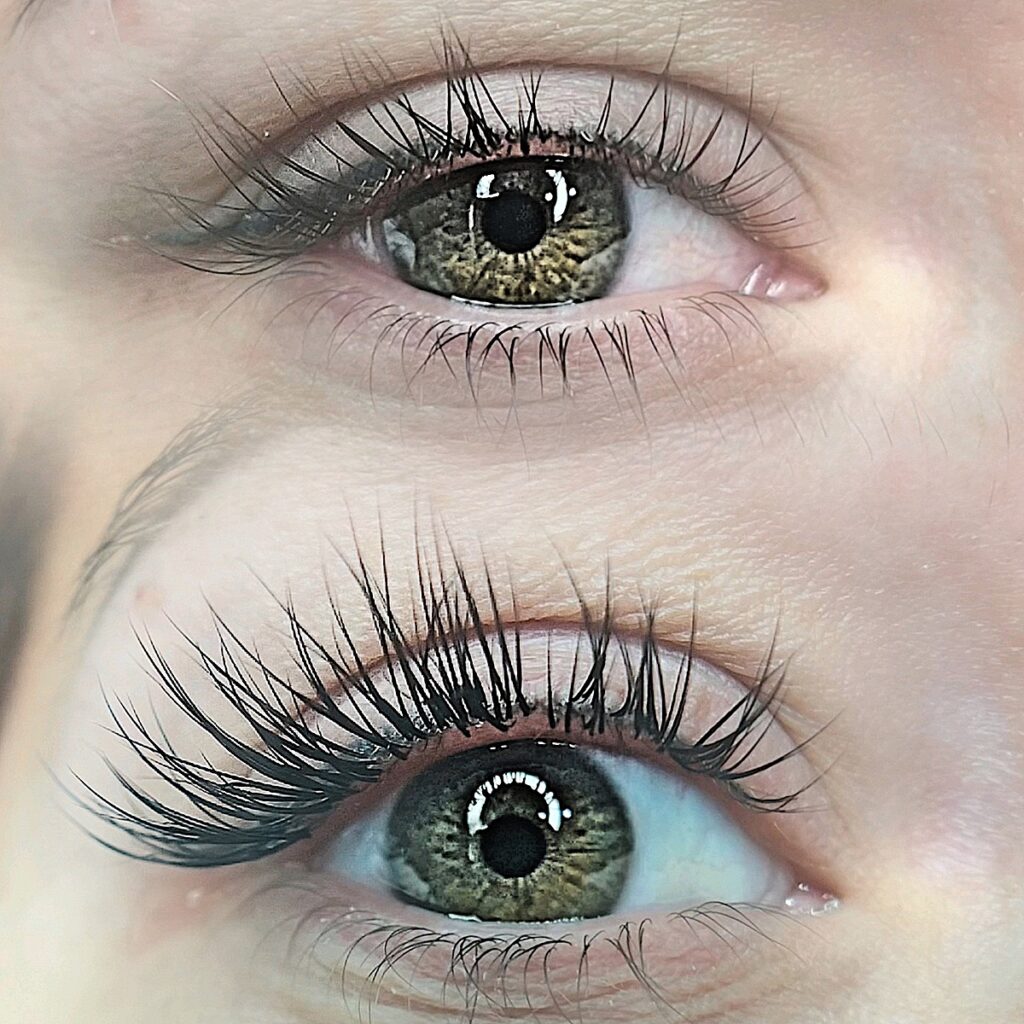 Natural looking individual lash extensions are shown on green eyes at Natural Beauty by Kelly, a permanent cosmetics and lash studio in downtown Prescott, AZ.