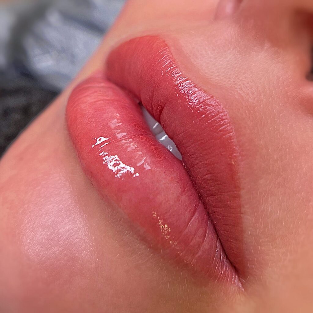 Natural looking lip blushing tattoo 